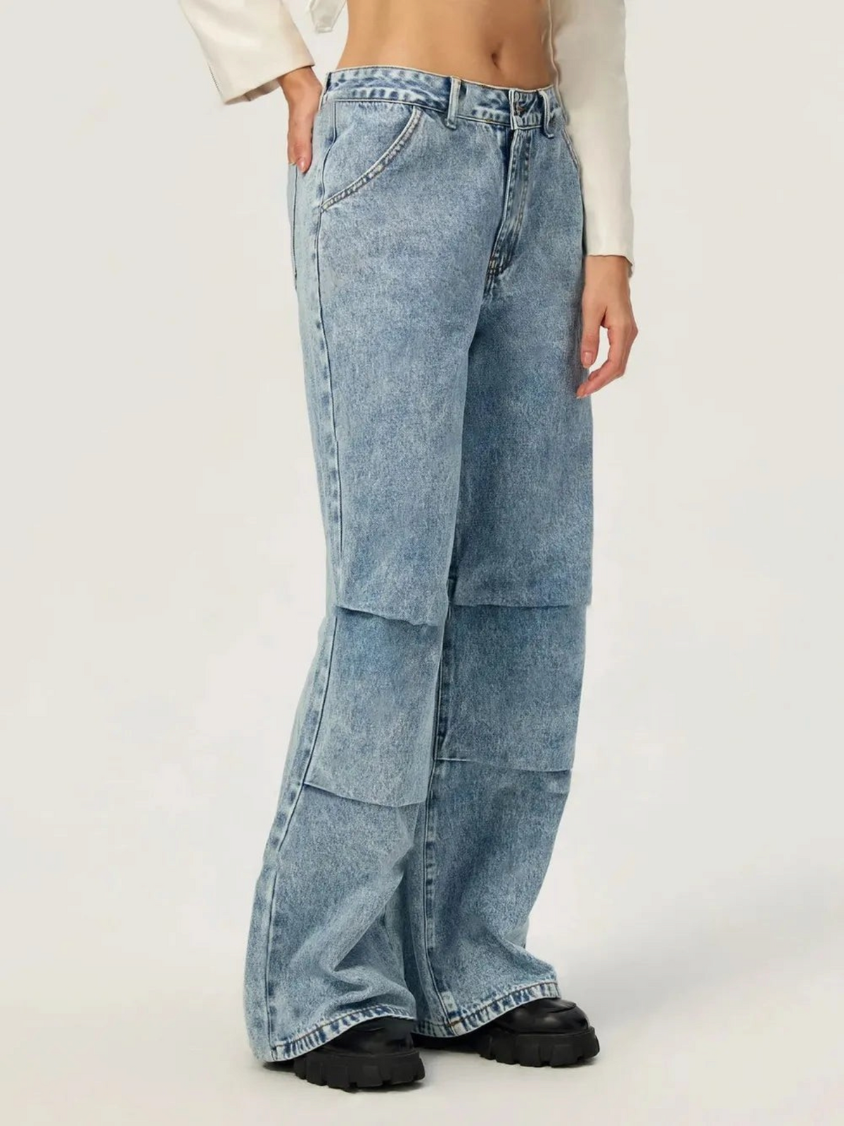 Catherine Martin wide leg cargo jeans in acid wash denim with pleated knee panels and high-waisted fit