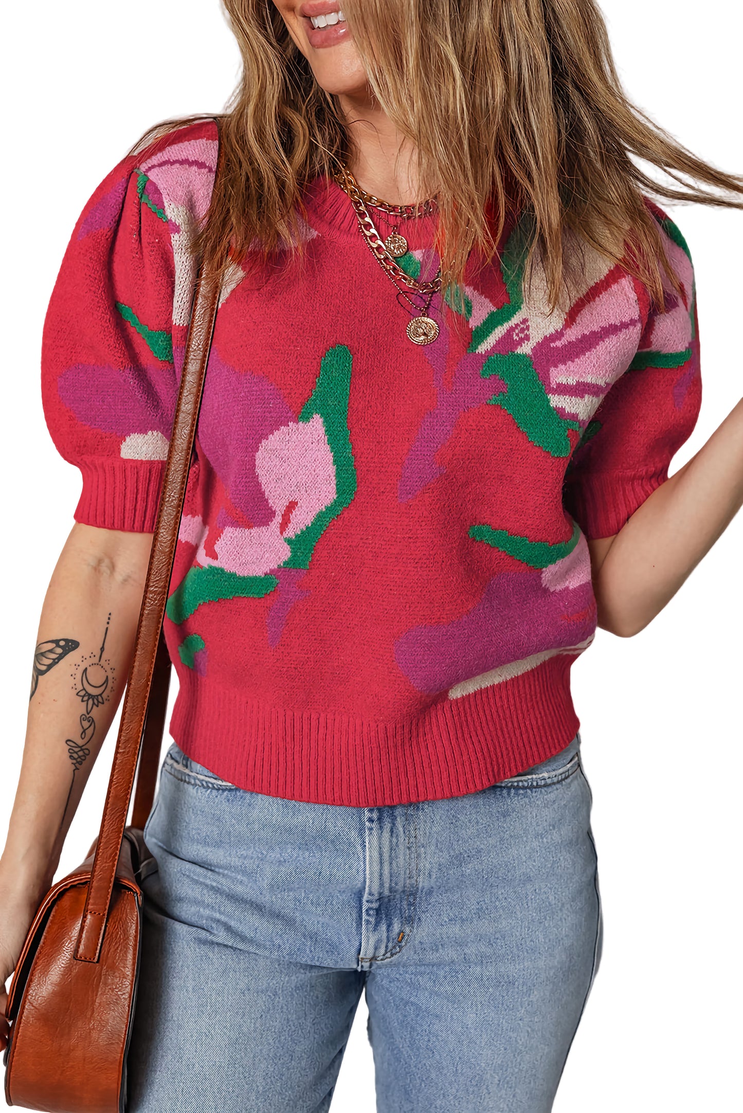 Model wearing floral puff sleeve knit top.