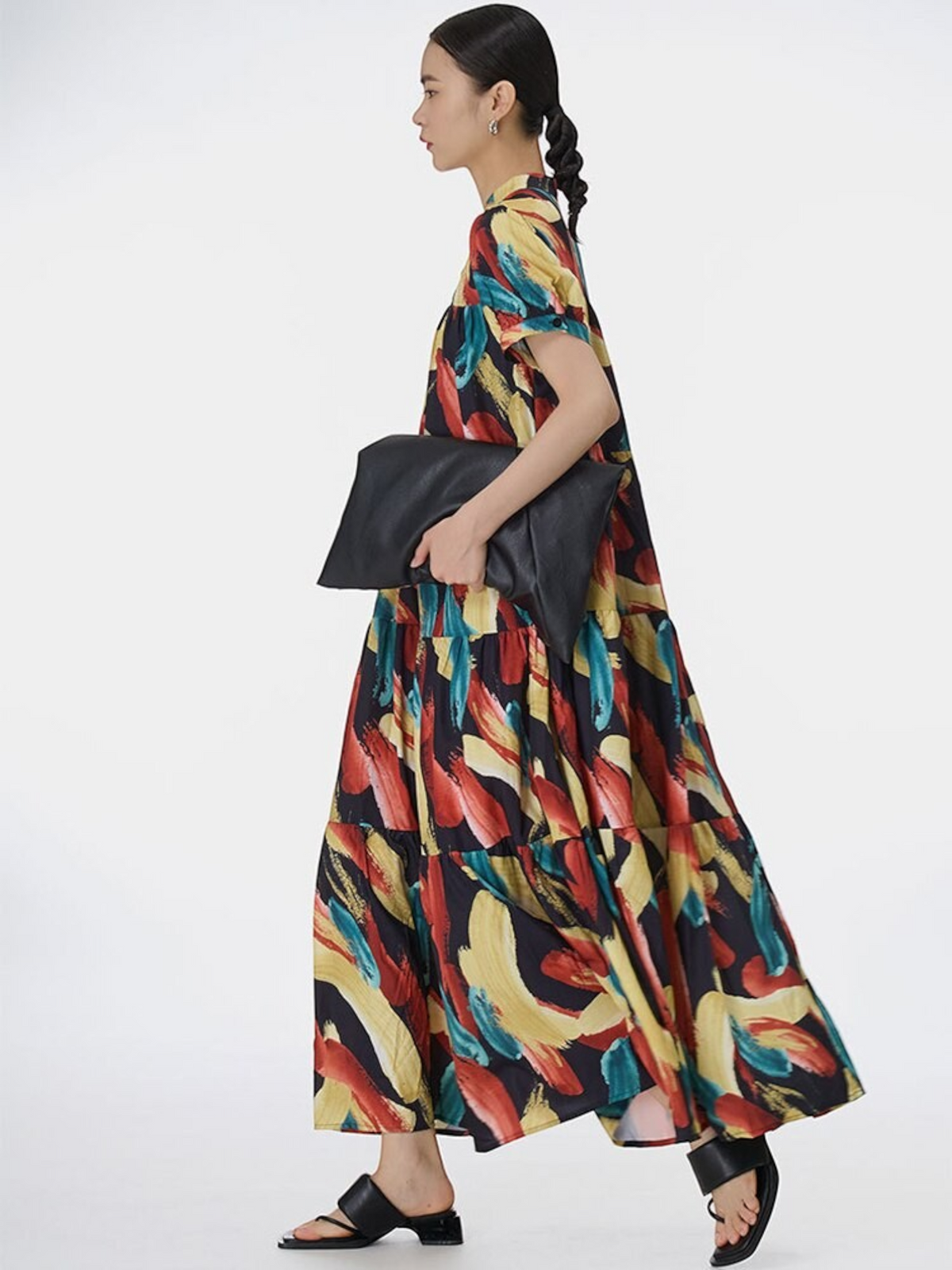 Catherine Martin midi dress with multicolour abstract brushstroke print, tiered pleated skirt, and short sleeves.