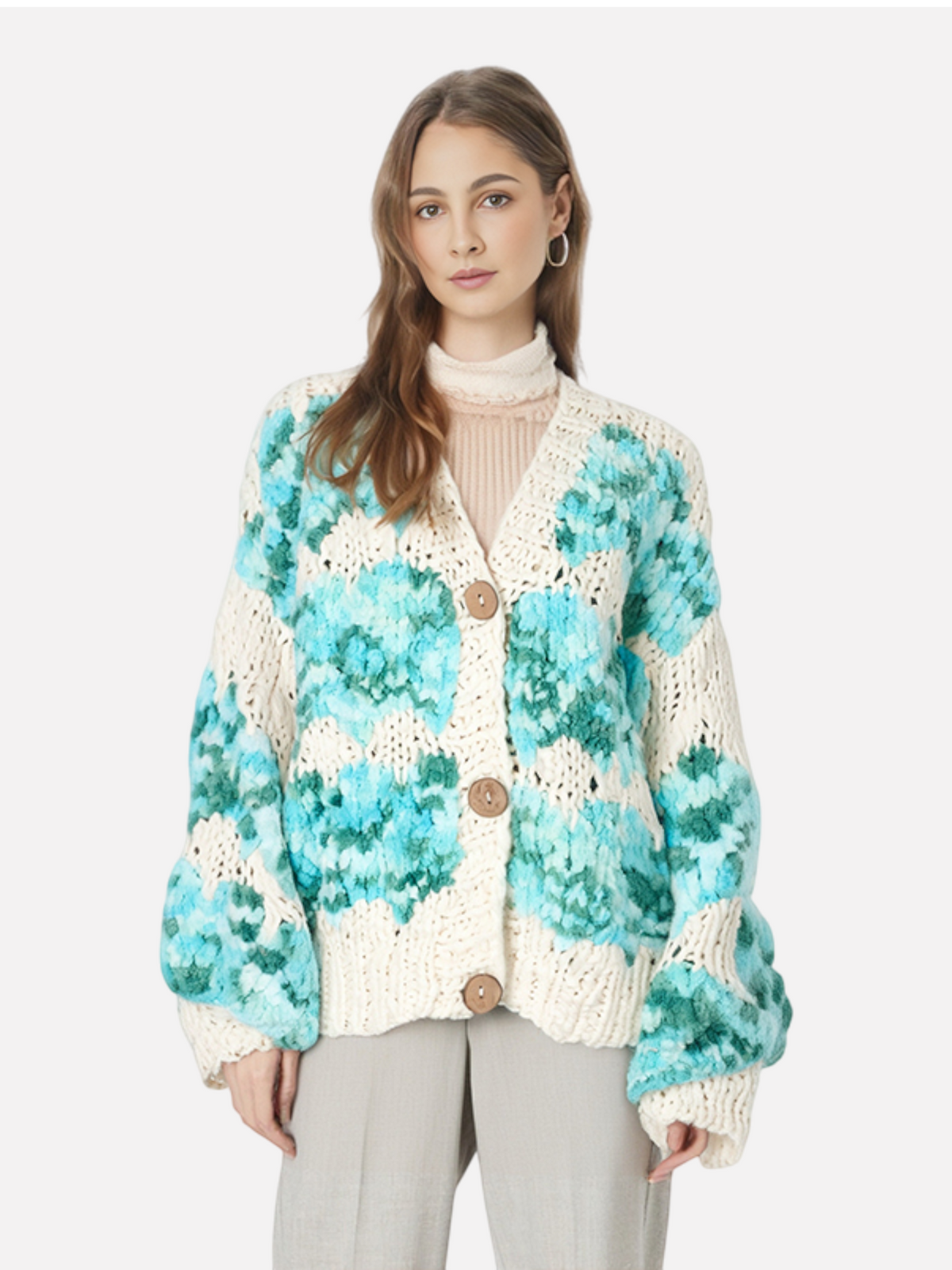 Catherine Martin oversized wool knit cardigan with mint and teal scallop pattern on a cream base, button-front design.