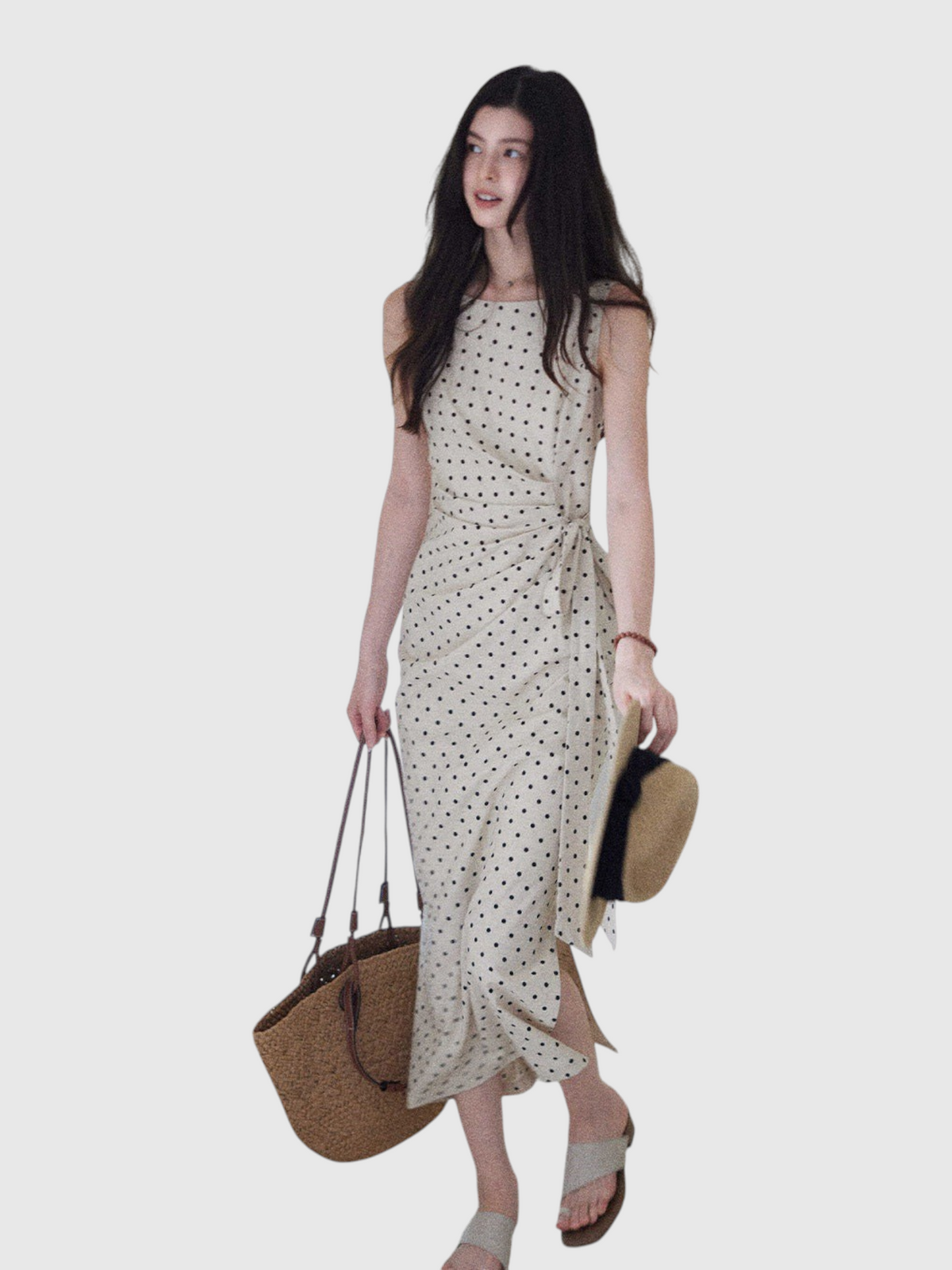 Catherine Martin polka dot midi dress in linen-cotton blend with side tie, boat neckline, and side slit detail.