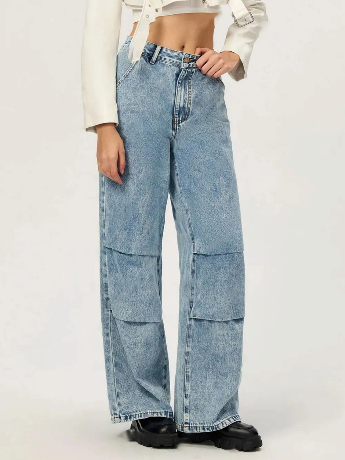 Catherine Martin wide leg cargo jeans in acid wash denim with pleated knee panels and a high-waisted fit