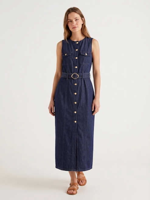 Catherine Martin sleeveless dark indigo denim maxi dress with gold buttons, chest pockets, and a belted waist.