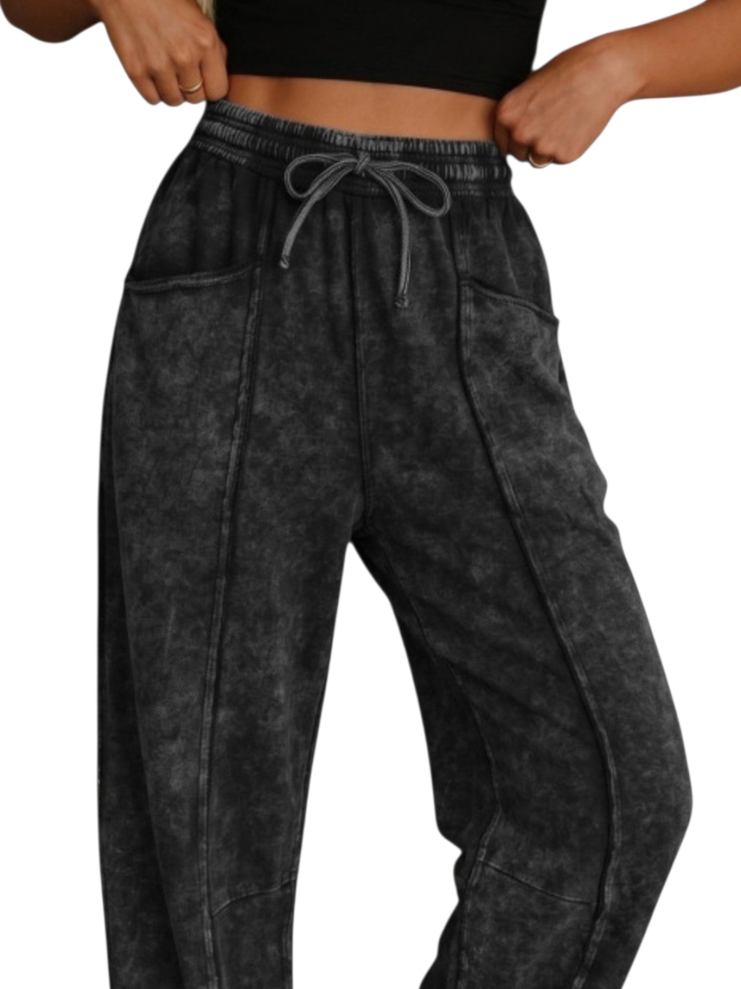 Acid washed drawstring wide-leg pants in black, front waistline and side pockets view