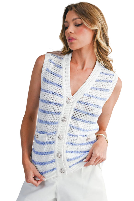 Woman wearing a sleeveless striped cardigan on a white background