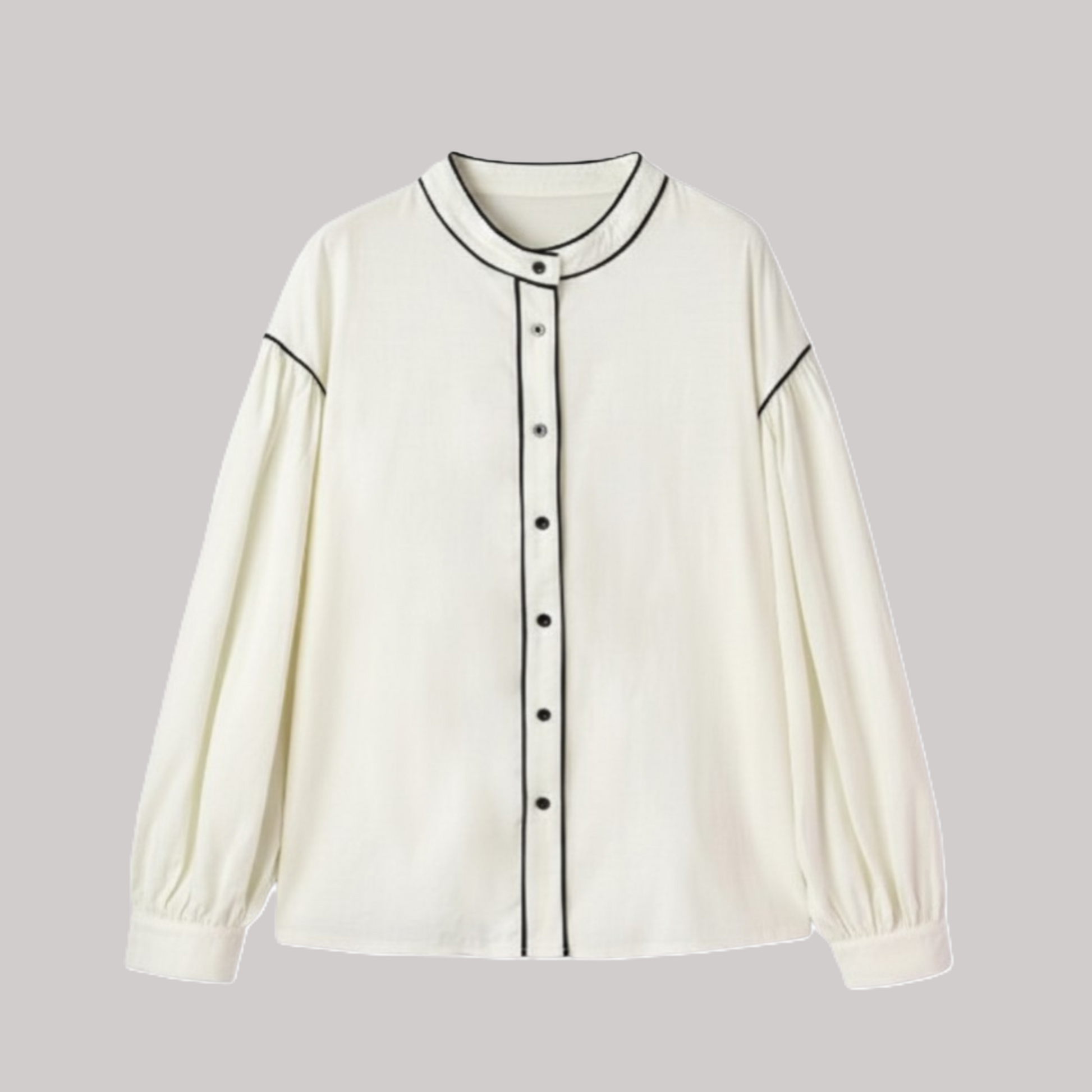 Front view of a cream-coloured bishop sleeve blouse featuring black contrast piping on a mandarin collar and a full-button placket.