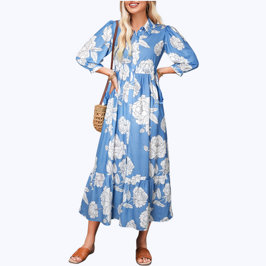 Woman wearing a blue floral dress on a white background