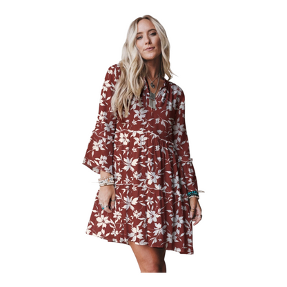 Woman wearing a floral dress on a white background