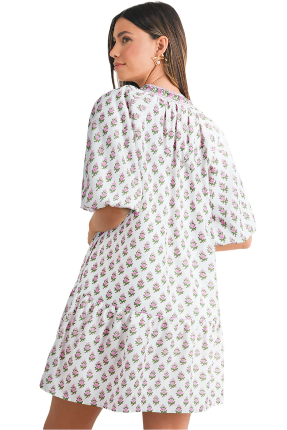Lightweight pink floral dress with a drawstring waist and playful ruffle hem, ideal for picnics or brunches.