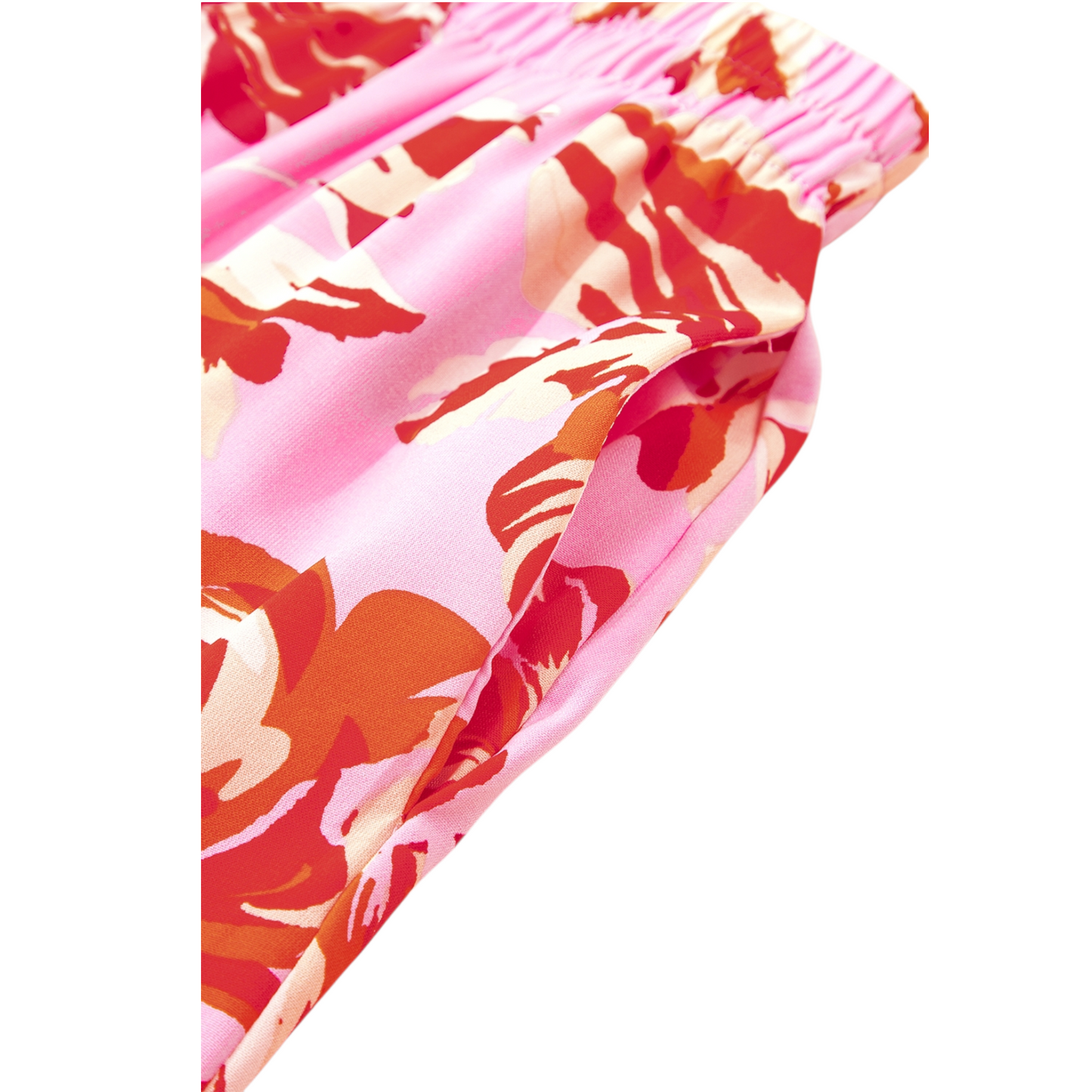 Close-up of a pink and red floral patterned fabric
