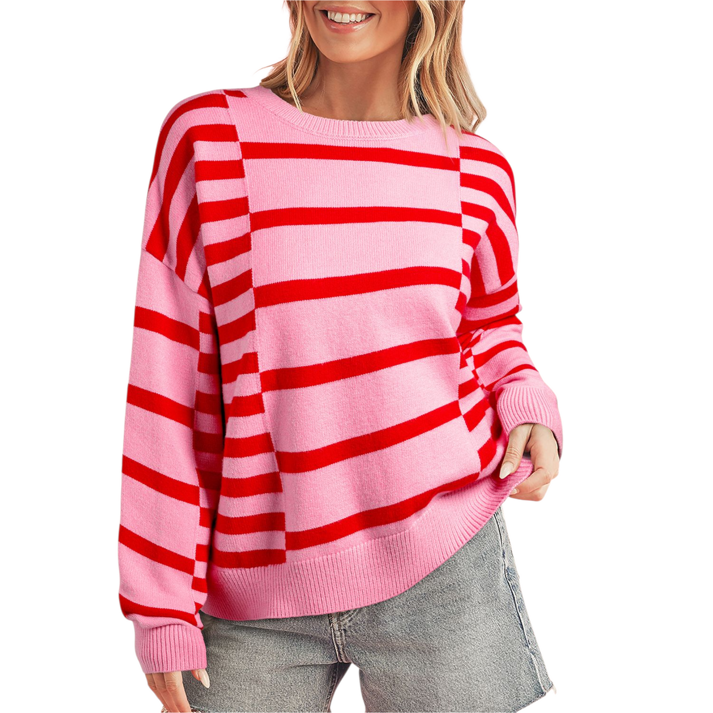 Person wearing a pink and red striped sweater on a white background
