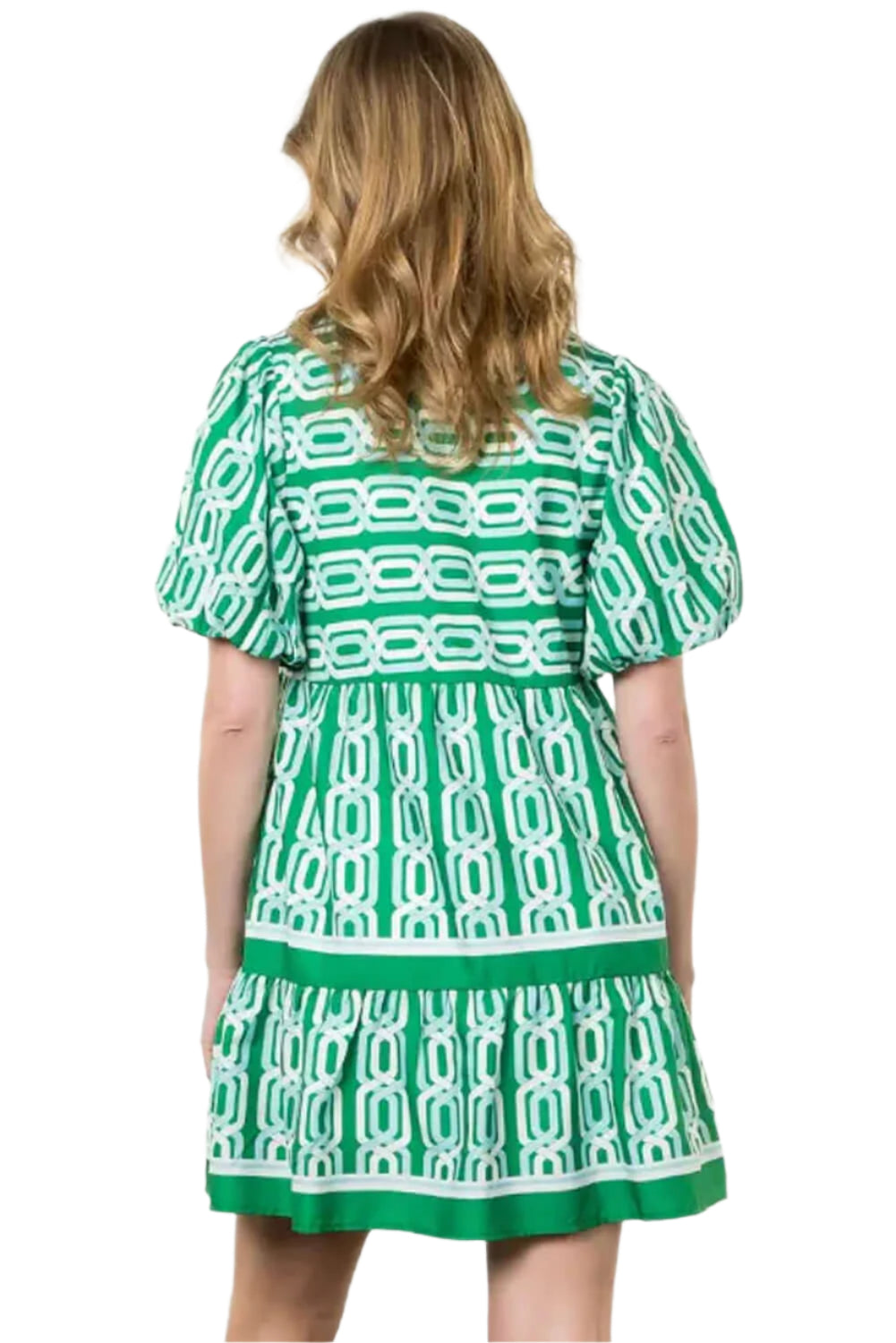 Back view of a woman in a bright green tiered mini dress with puff sleeves, perfect for summer events and casual outings.