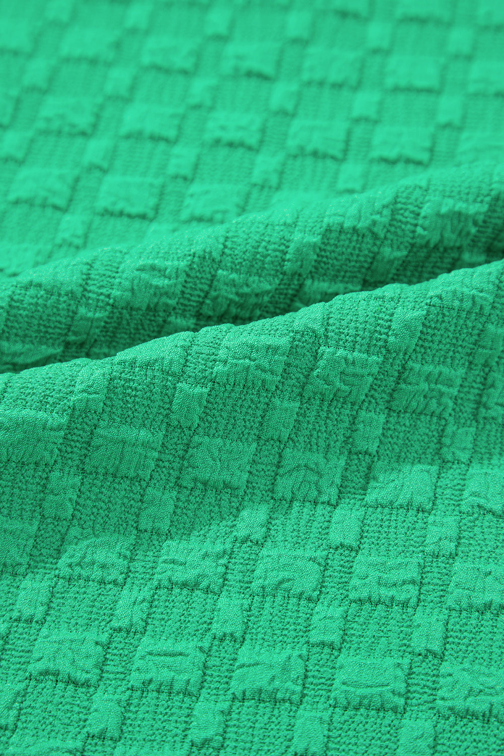 Bright Green Textured Top Womens. Fabric view.