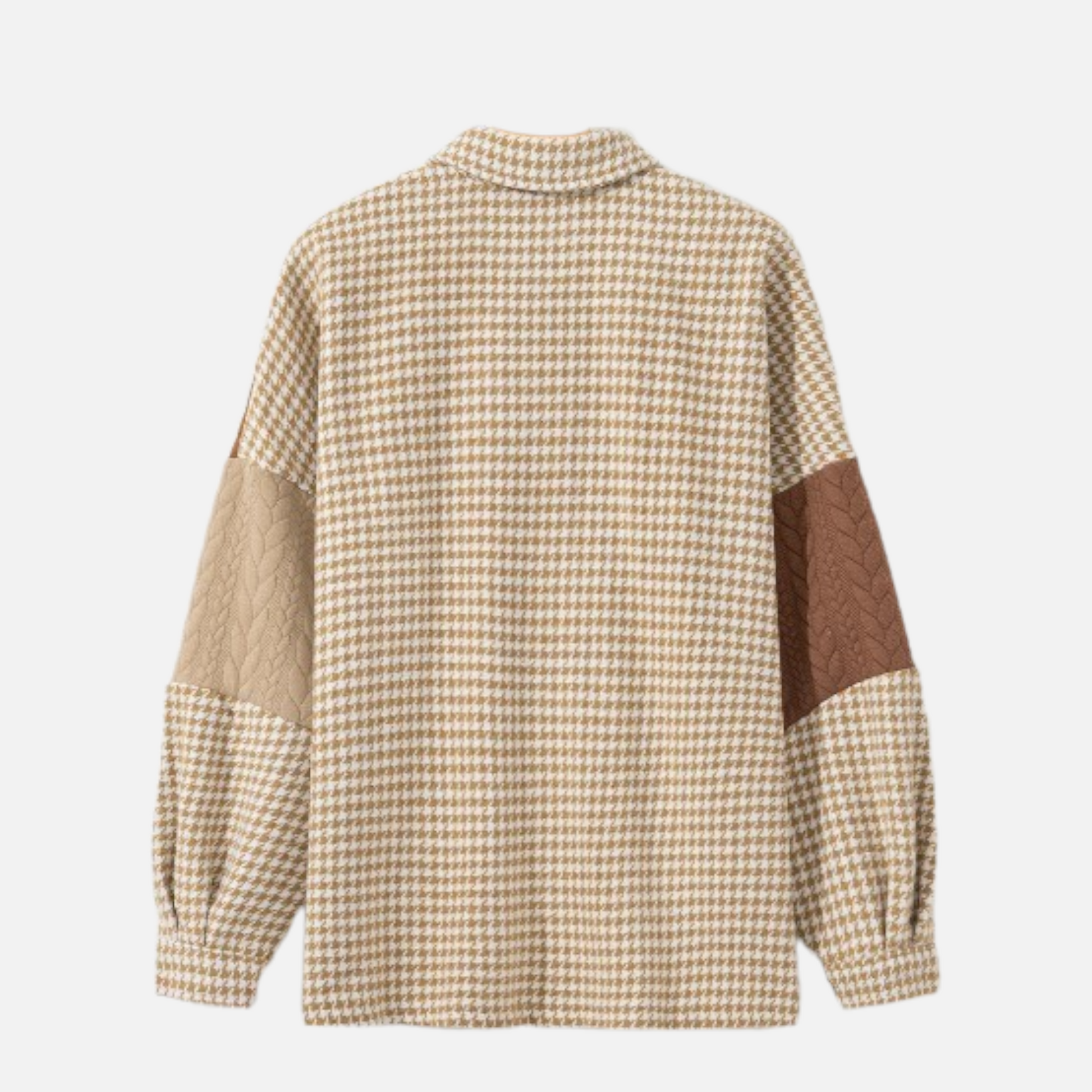 Back view of a brown and tan houndstooth and cable-knit patchwork shacket, highlighting the textured fabric design.