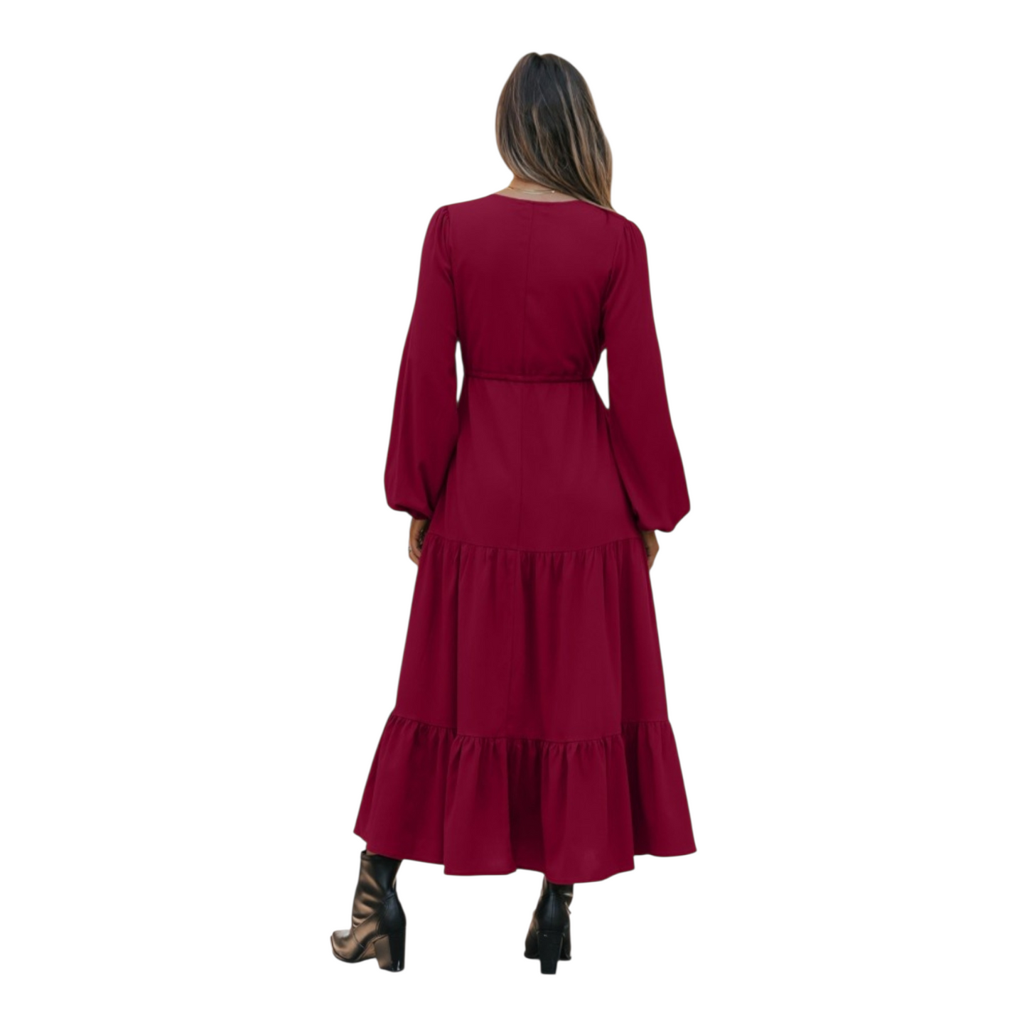 Woman in a burgundy, long-sleeve, tiered maxi dress with a V-neckline and drawstring waist, paired with black ankle boots