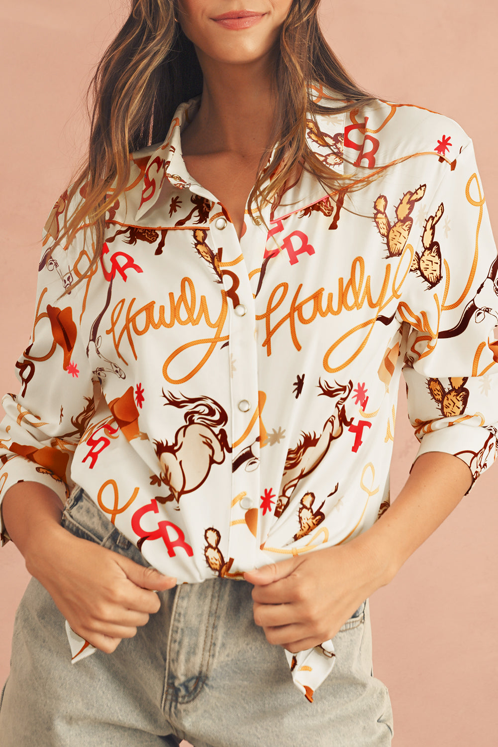 Stylish front view of a model in a beige Howdy abstract print shirt with long sleeves.