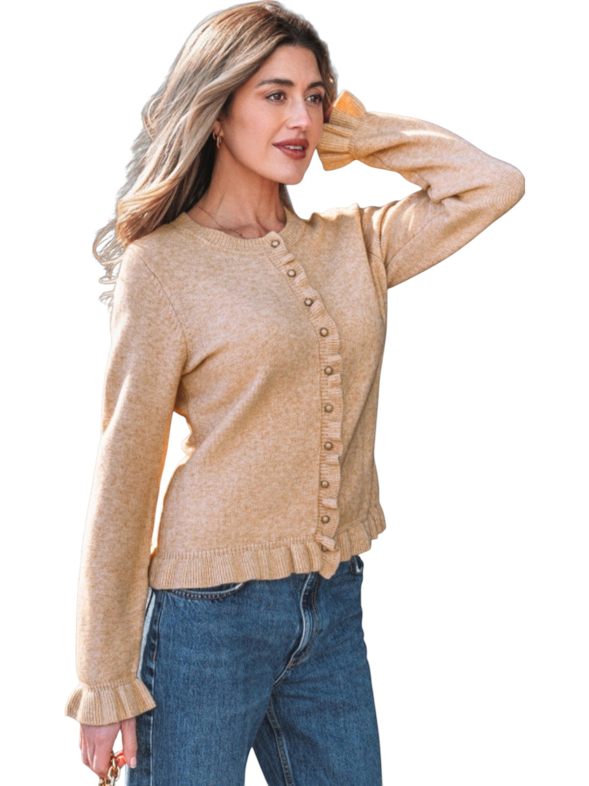 Catherine Martin beige knit cardigan with ruffle trim and gold buttons worn by a woman with blonde hair