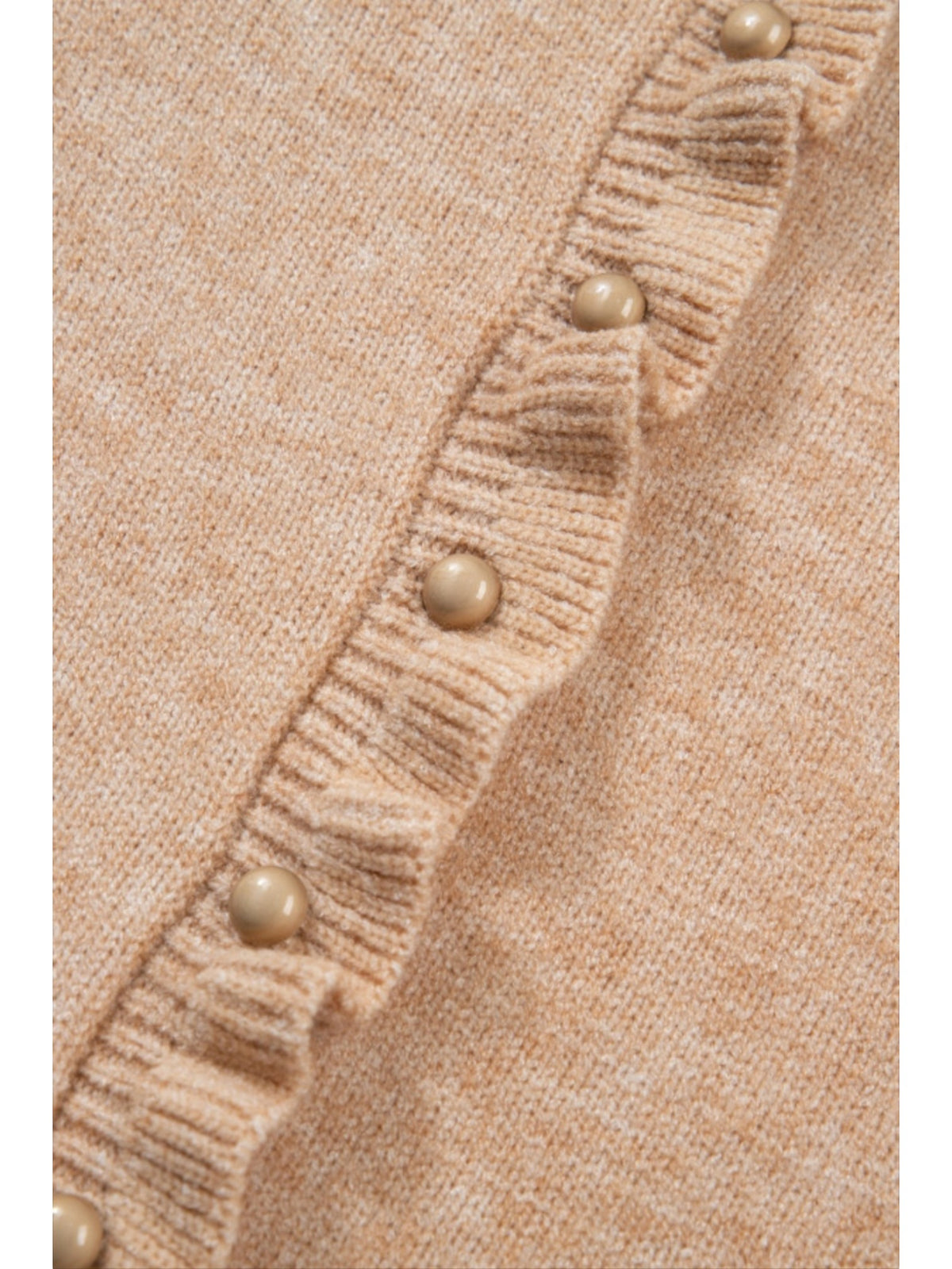 Catherine Martin beige knit cardigan featuring a delicate ruffle trim along the placket and polished gold buttons.