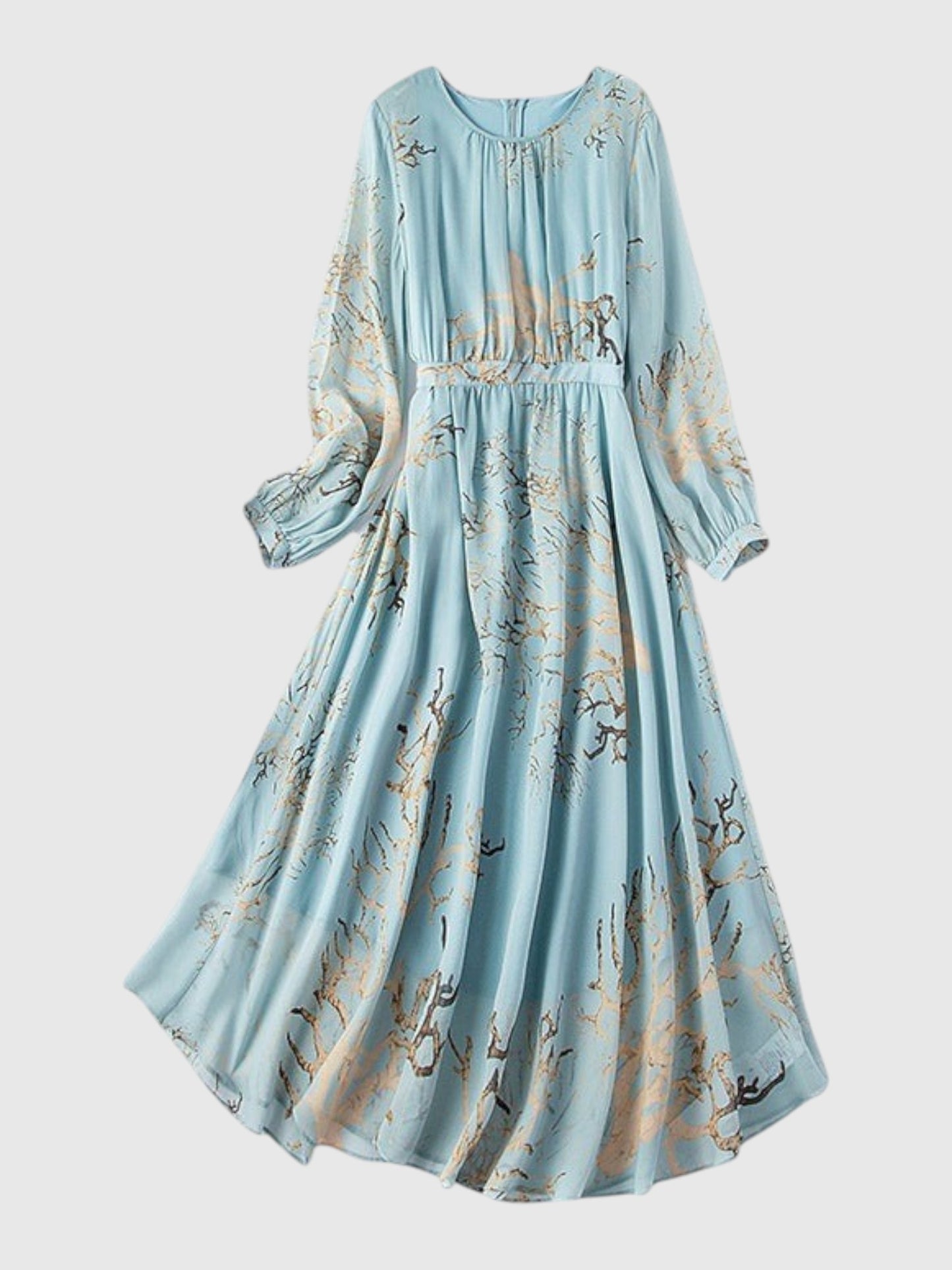 Catherine Martin powder blue mulberry silk midi dress with gold and brown branch print, pleated waist, and long sleeves.