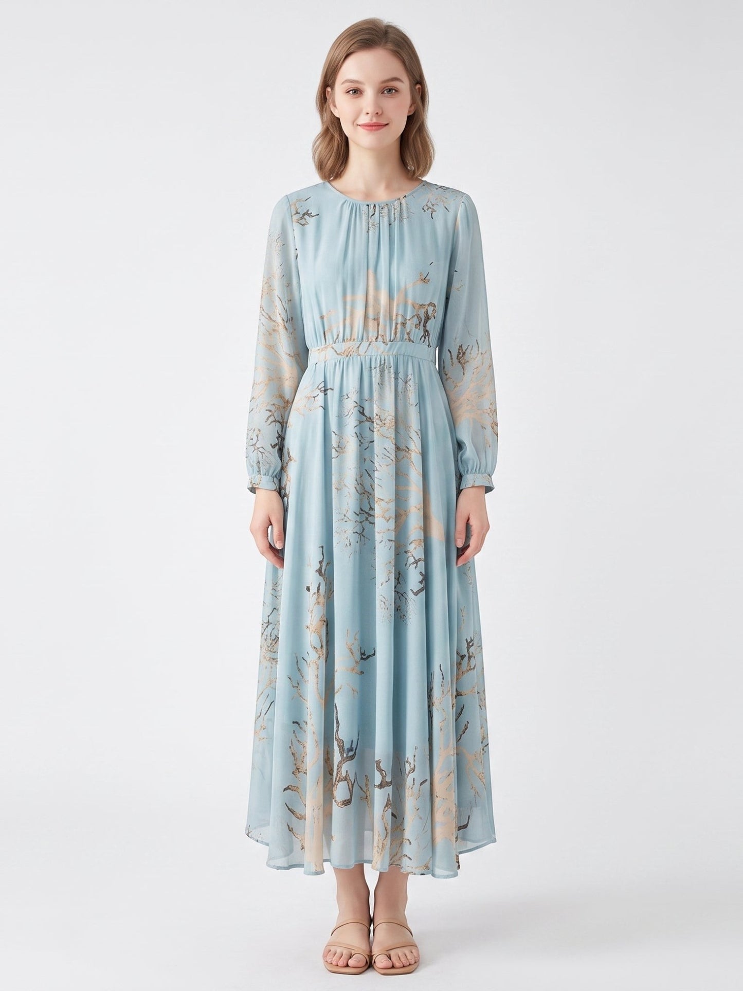 Catherine Martin blue mulberry silk midi dress with gold and brown branch print, long sleeves, and pleated waist.