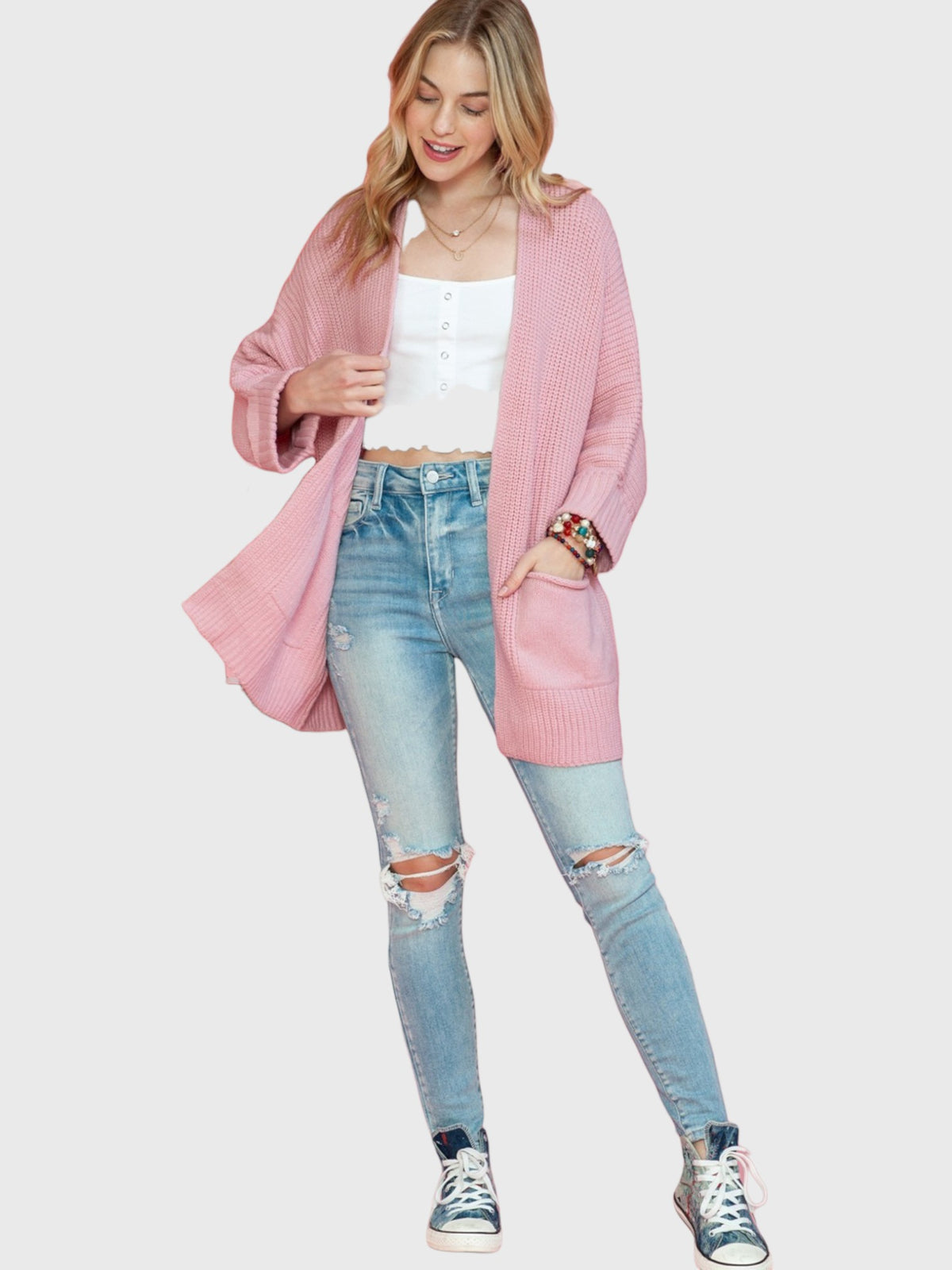 Catherine Martin dusty pink oversized open front knit cardigan with patch pockets and ribbed cuffs on a blonde model