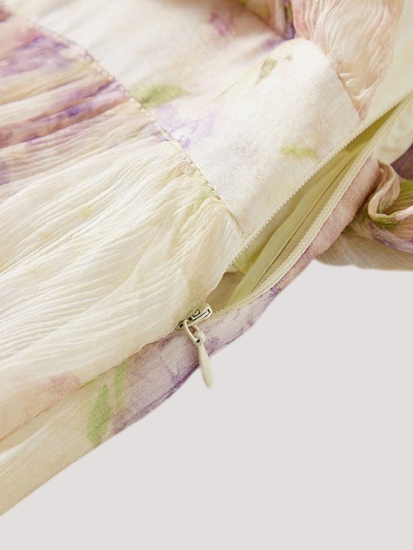 Catherine Martin silk midi dress featuring a lilac and cream floral print with a discreet side zipper closure