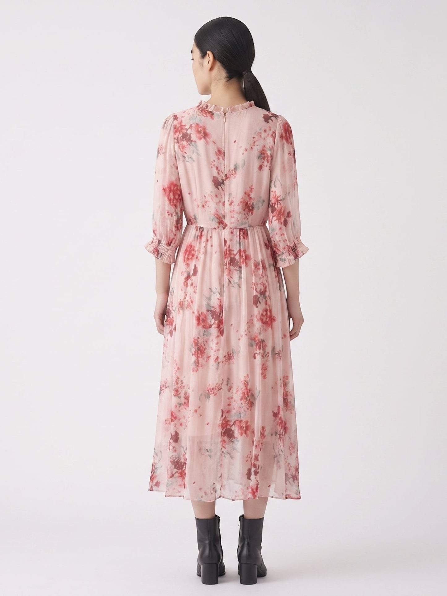Catherine Martin floral silk midi dress with round neck and three-quarter sleeves, back view on a model
