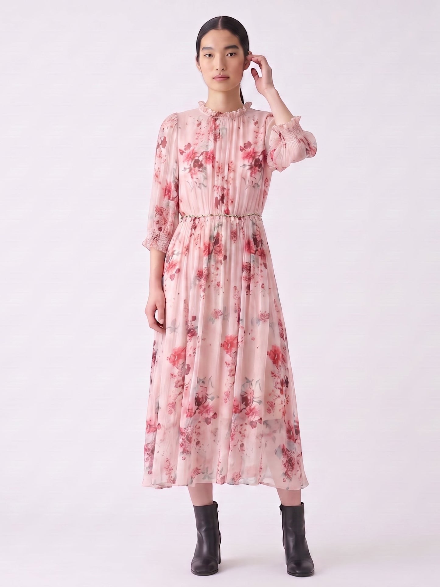 Catherine Martin floral silk long dress with round neck, ruffled details, and embellished waist on a model