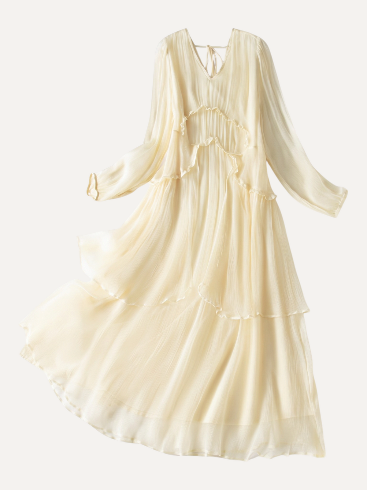 Catherine Martin light yellow mulberry silk maxi dress with V-neck, long sleeves, and tiered ruffle skirt details.