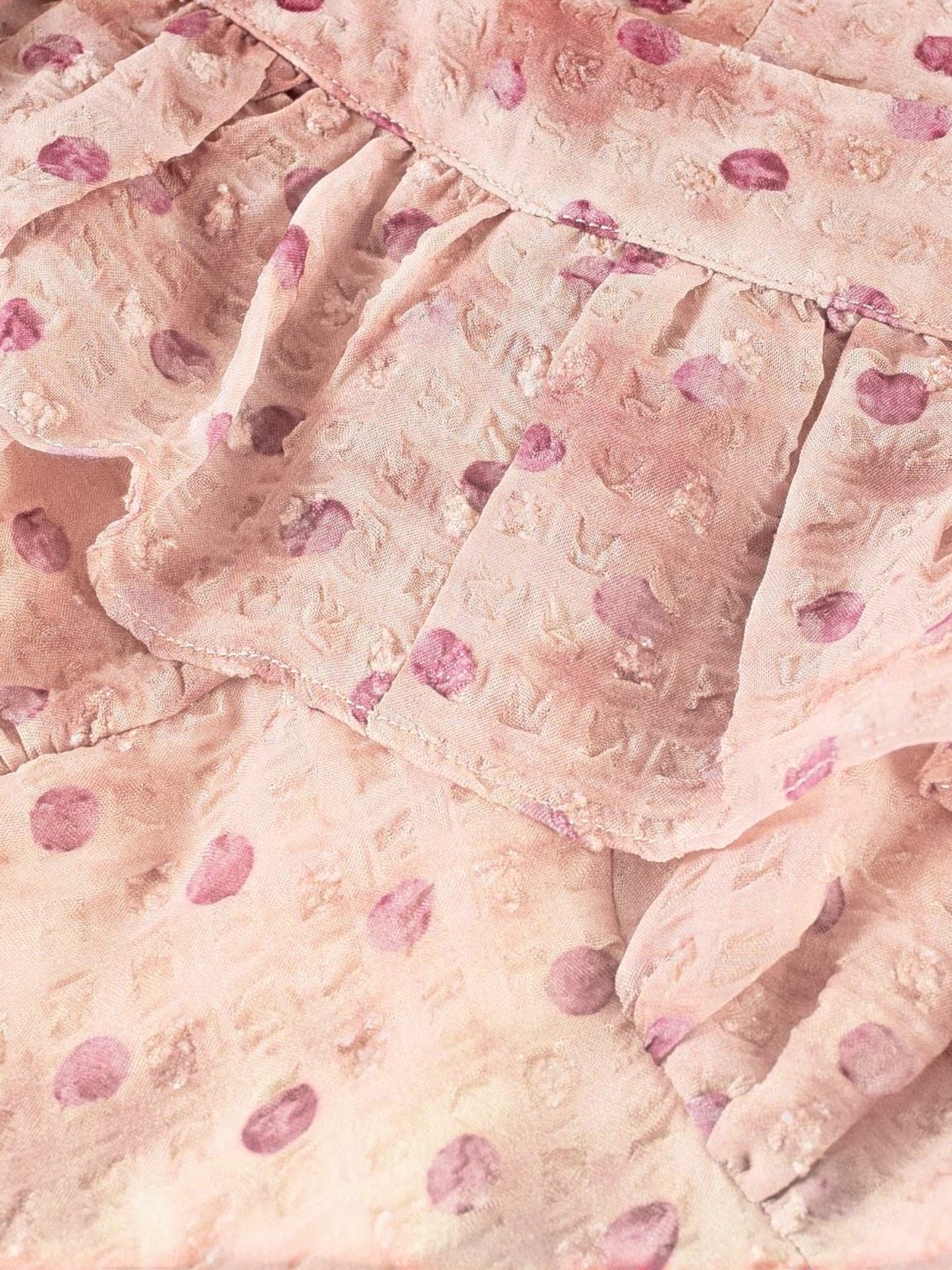Catherine Martin dusty pink maxi dress featuring a ruffled square neckline with a ditsy floral and polka dot print.