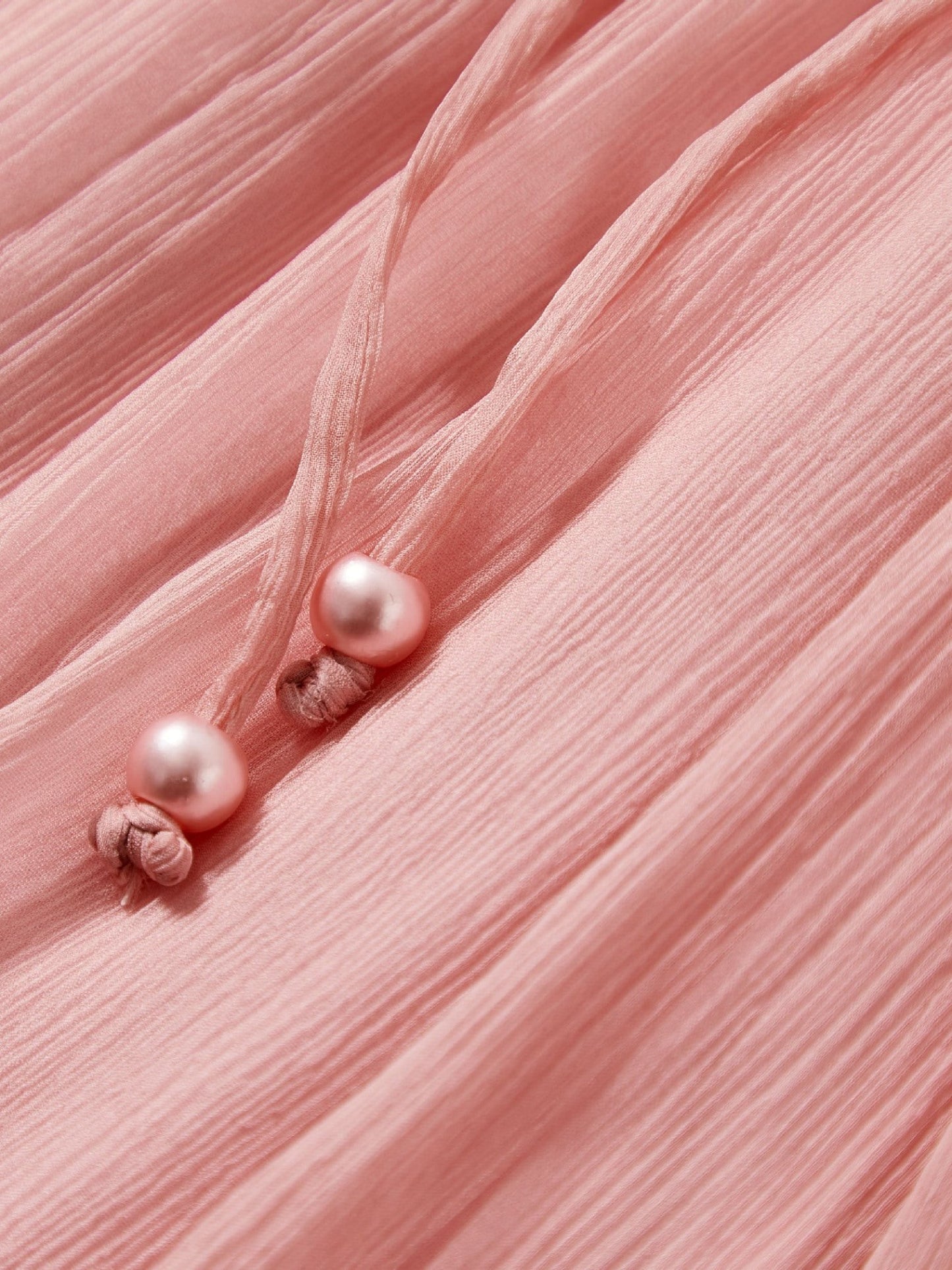 Catherine Martin soft pink crinkled silk midi dress featuring delicate tie cords with matching beaded ends