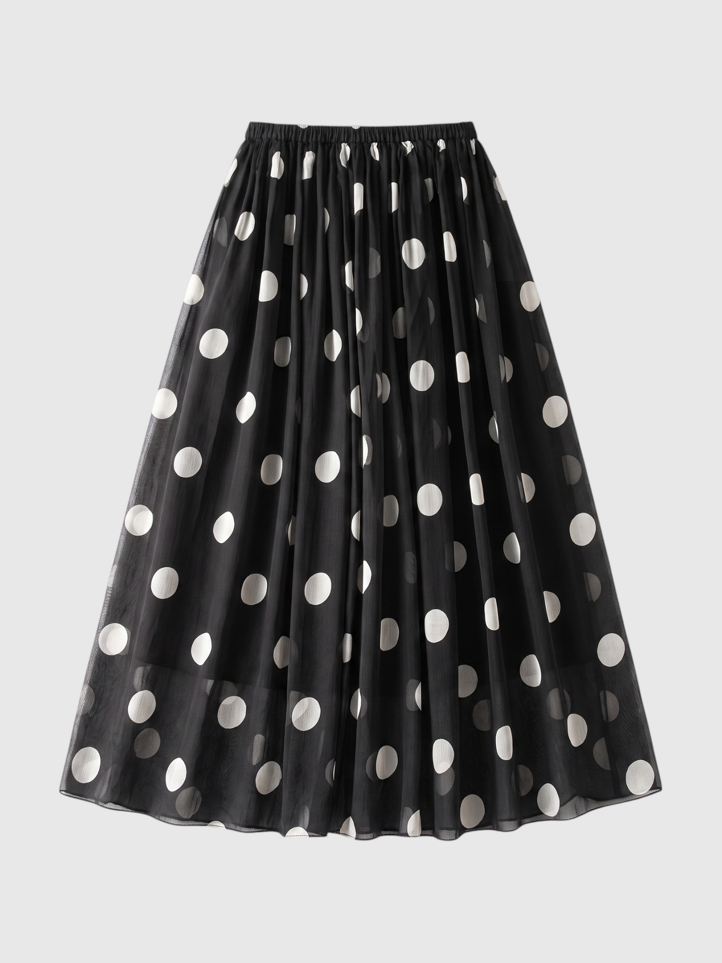 Catherine Martin black and white polka dot silk midi skirt with an A-line silhouette and elastic waistband.