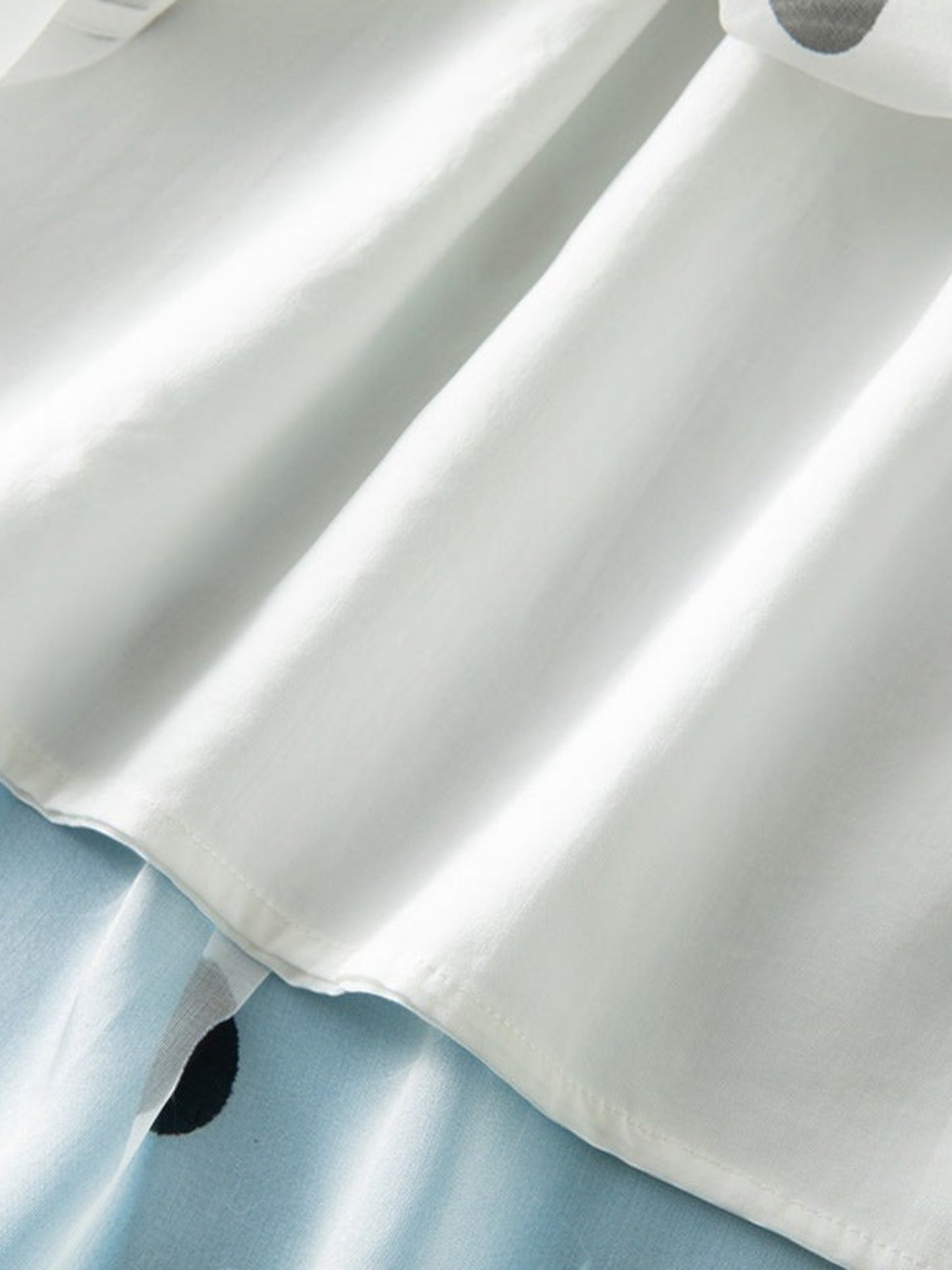 Catherine Martin white silk midi skirt with black polka dots and fine pleating detail