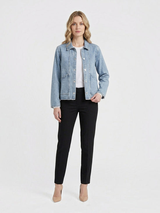 Catherine Martin light-wash denim jacket with scalloped trim, collared neckline, and pearl-style snap button closure.