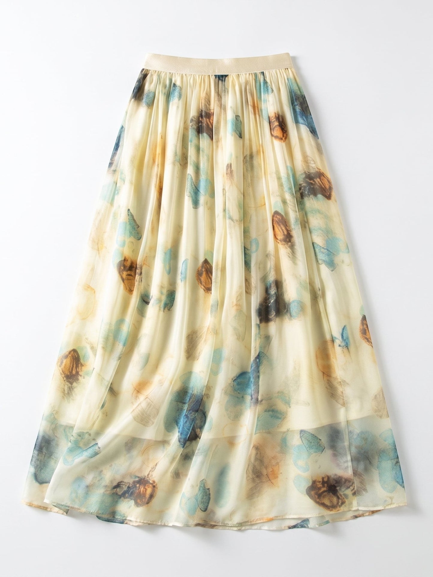 Catherine Martin pleated midi skirt in silk chiffon with a blue and gold watercolour print on pale yellow.