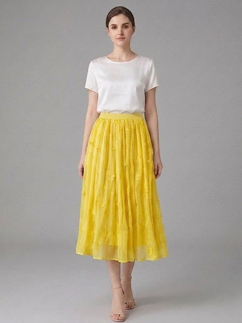 Catherine Martin yellow silk chiffon midi skirt with butterfly and floral embroidery worn with a white top and heels