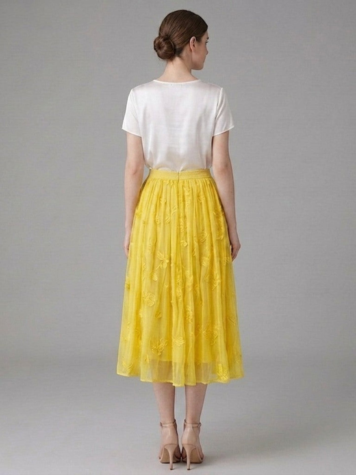 Catherine Martin yellow silk chiffon midi skirt with floral and butterfly embroidery, shown from the back view.