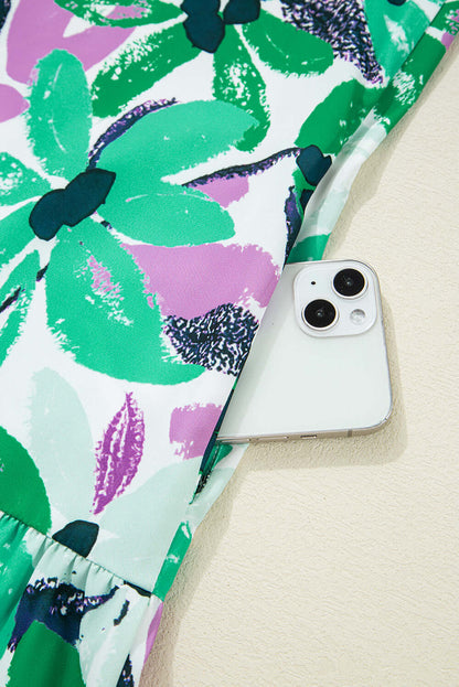 Lightweight floral dress perfect for casual outings. Pocket view.