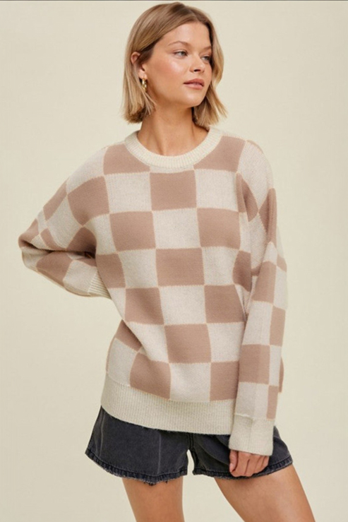 Mocha checkerboard crew neck knit sweater front view showing oversized relaxed fit and ribbed hem detail