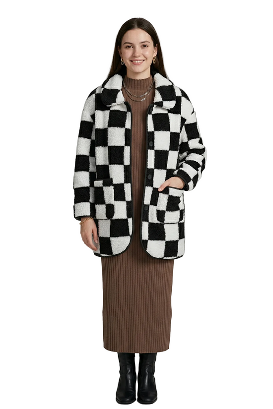 Full-length front view of a model in the checkerboard fleece coat, featuring a classic notched collar and oversized front patch pockets.