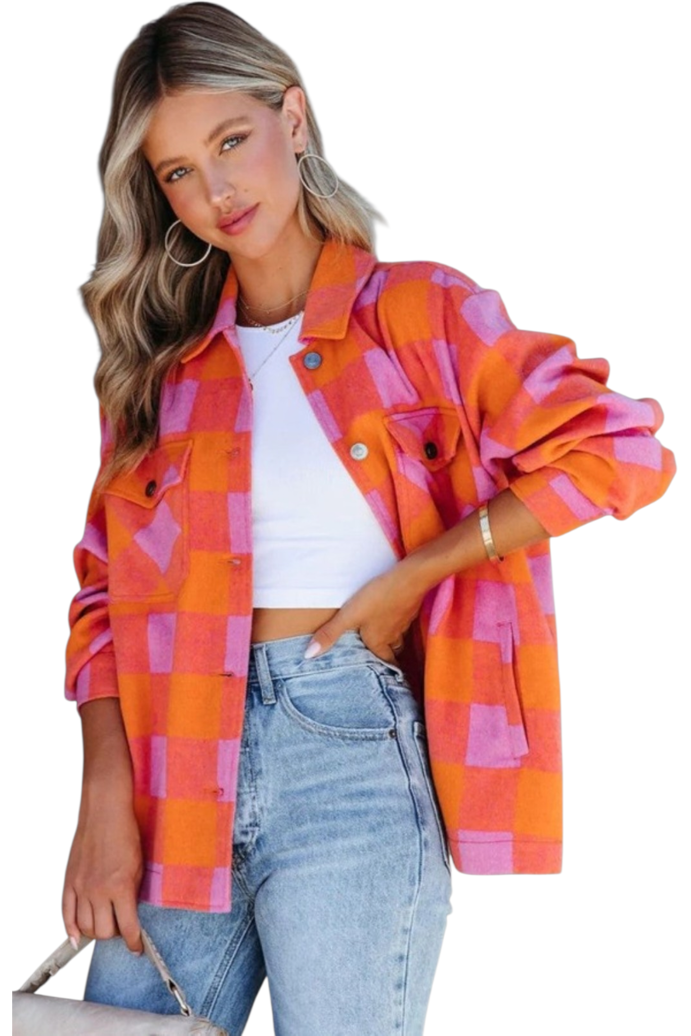 Three-quarter front view of a model showcasing the shacket's relaxed silhouette and dropped shoulders, paired with light-wash denim.