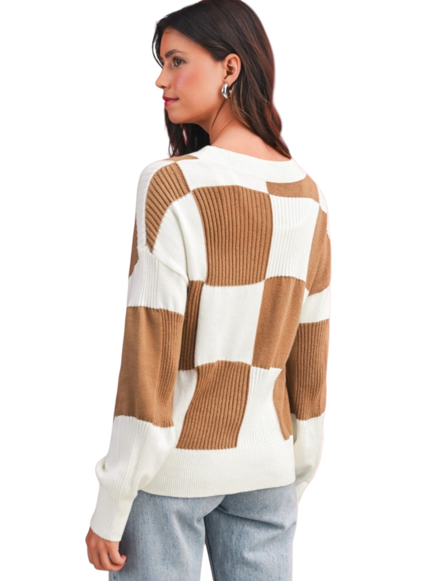A woman wearing a brown and off-white checkered knit sweater, shown from a side-back angle against a plain white background.