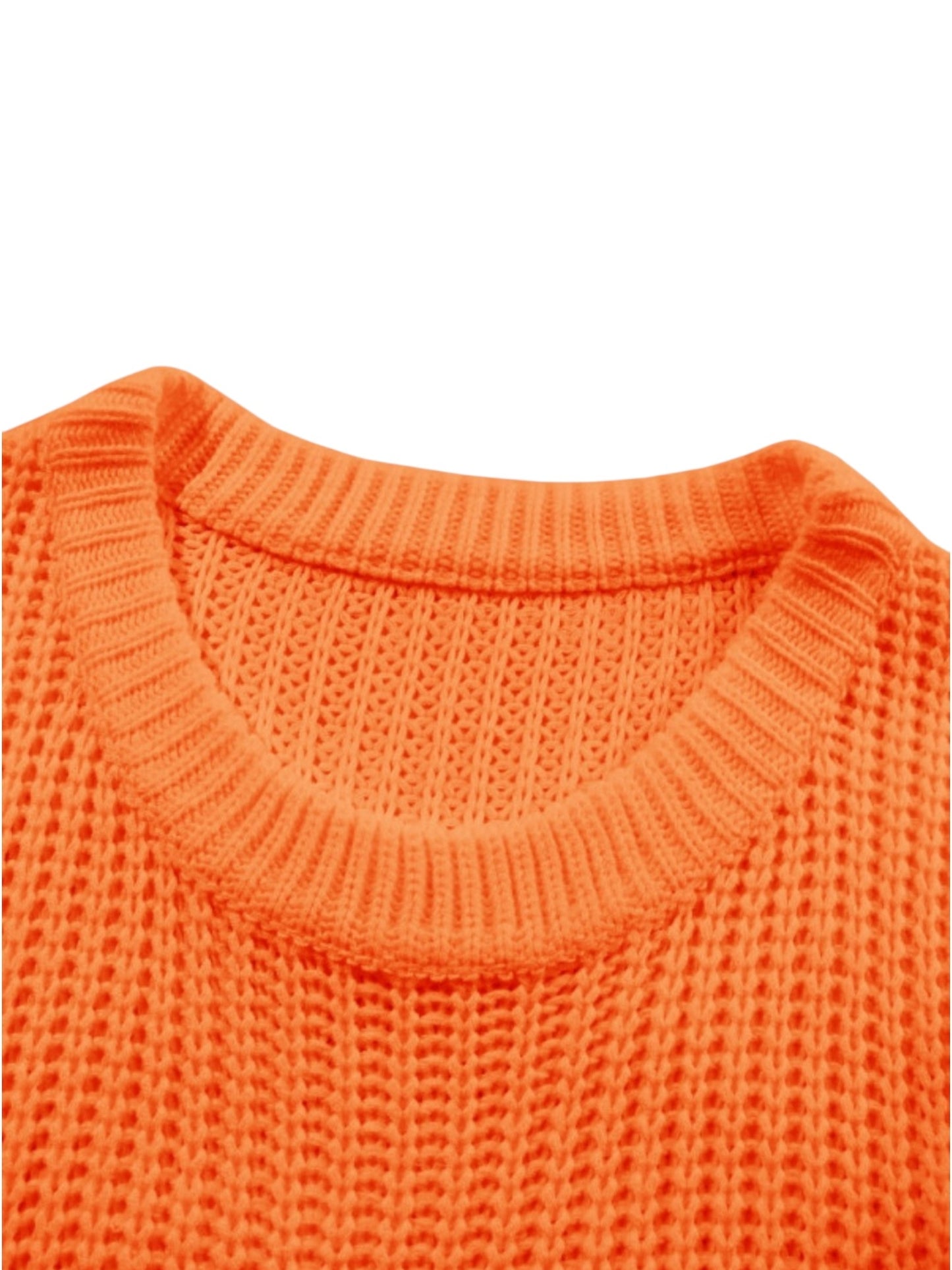 Close-up of a bright orange ribbed knit sweater showing the crew neck collar and textured knit pattern against a white background.
