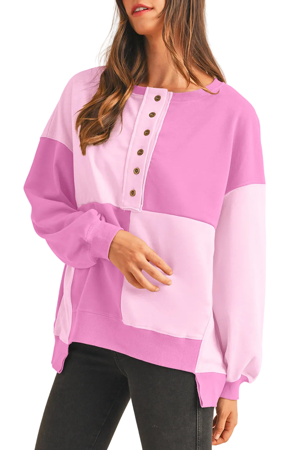 Woman wearing a pink and white blouse with a white background