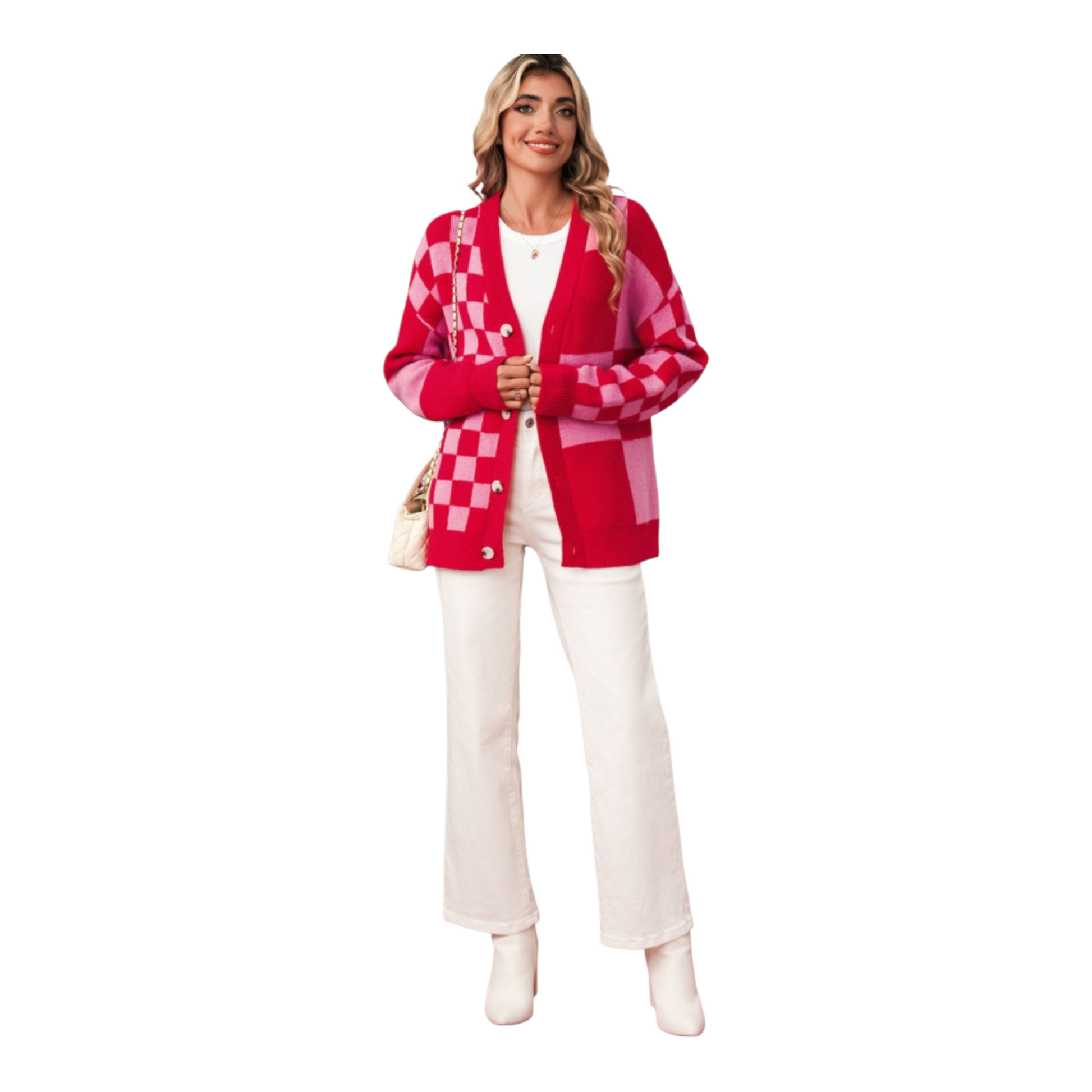 Woman wearing a red and pink checkered cardigan with white pants on a white background