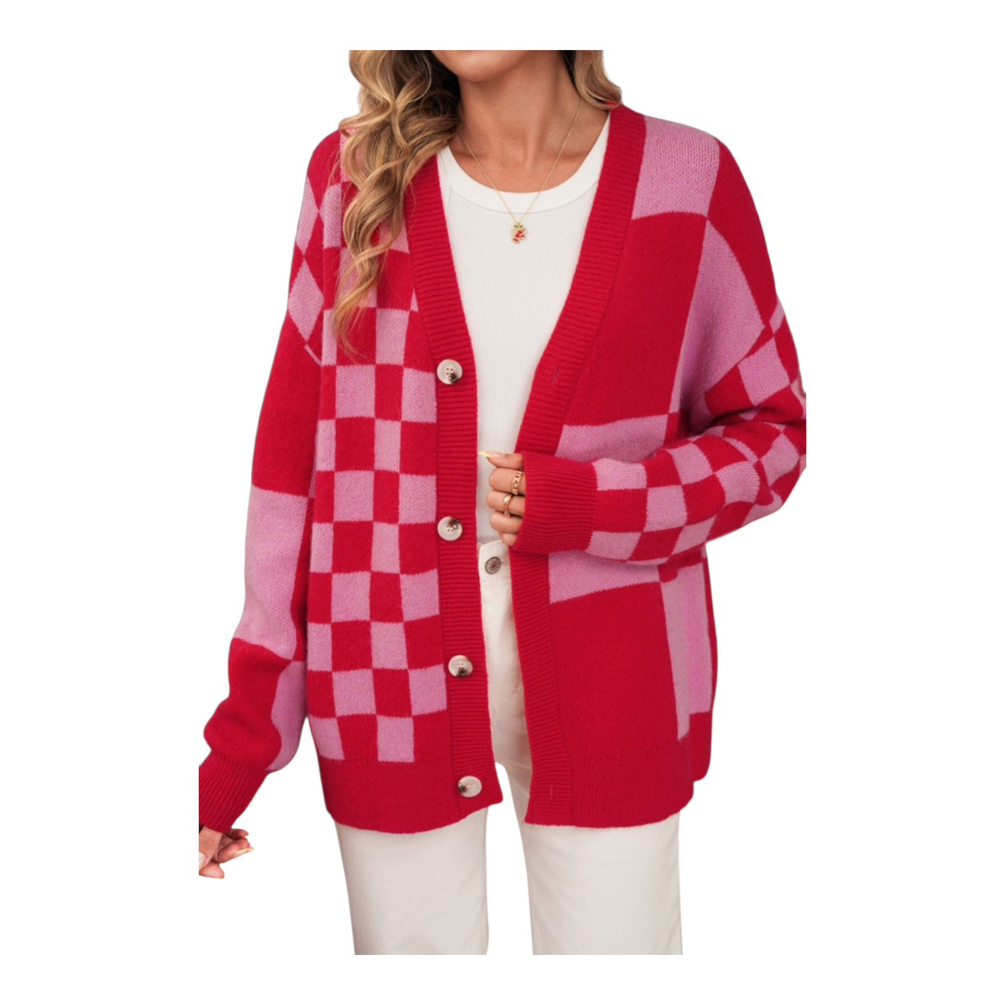 Red and pink checkered cardigan worn by a person on a white background