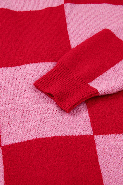 Close-up of a red and pink checkered fabric with a folded edge.