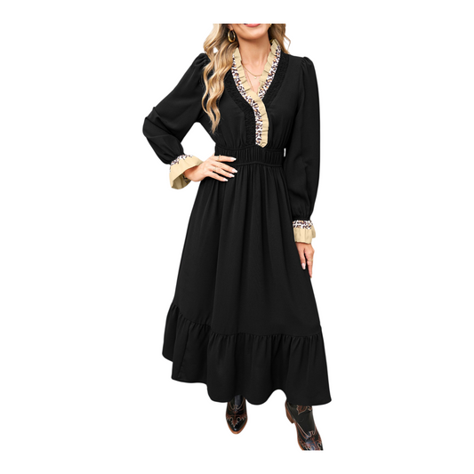 Black dress with decorative elements on a white background