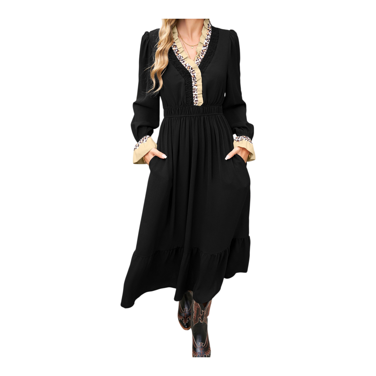 Black dress with decorative trim worn by a model on a white background