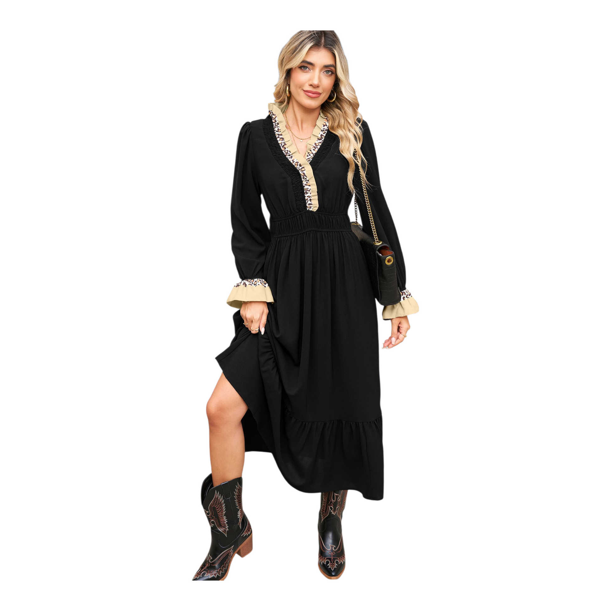 Woman wearing a black dress with lace details and cowboy boots on a white background